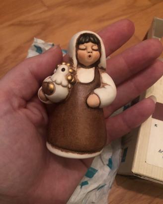 Donna con gallo Thun