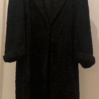 Pelliccia di astrakan di alta sartoria