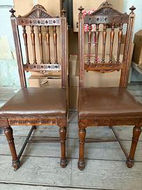 due sedie neoclassiche in noce con seduta in pelle