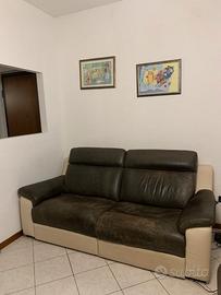Divano in pelle 3 posti Atomik con relax elettrici