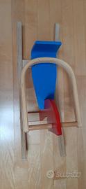 Cavalluccio a dondolo in legno.