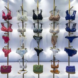 Arredo negozio abbigliamento linea oro