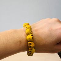 Bracciale elastico teschi gialli