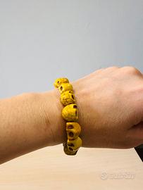 Bracciale elastico teschi gialli