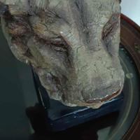 Scultura testa di leonessa