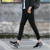 Due paia di pantaloni in cotone