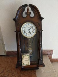 orologio pendolo in legno con garanzia