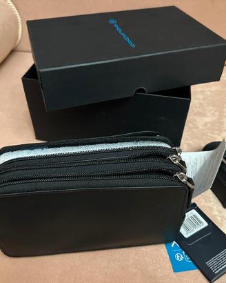 Pochette Piquadro con 3 cerniere colore nero