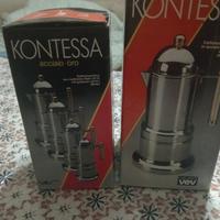caffettiere espresso in acciaio con manici dorati
