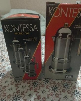 caffettiere espresso in acciaio con manici dorati