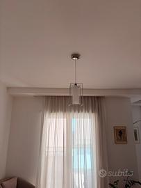 Lampadario vetro e acciaio