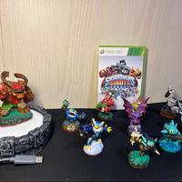 Videogioco + 11 personaggi + piattaforma