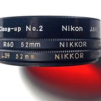 NIKON  Nikkor  accessori (paraluci, filtri, ecc) 