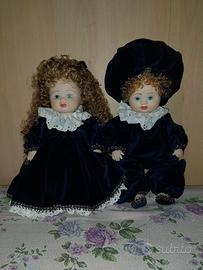 coppia bambole in ceramica