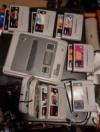 Super Nintendo con cavi, 2 controller e 12 giochi,