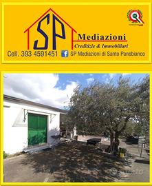 Terreno con fabbricato