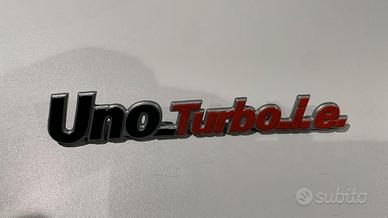 scritta Uno turbo i.e.