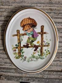 Piattino da parete in ceramica.