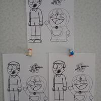 Tre Stampe & Due Sorpresine Kinder "Doraemon"
