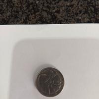 monete 50 lire 1974  con errore di conio 