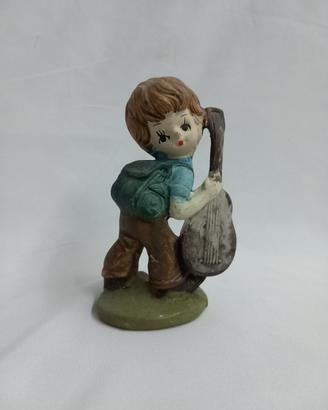 Statuetta bambino scout