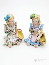 Coppia rara Bimbe con cestino anni60