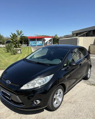 Ford Fiesta titanium 1.4 tdci 68cv 2010