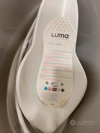 Vasca da bagno e riduttore di seduta piu’ tubo