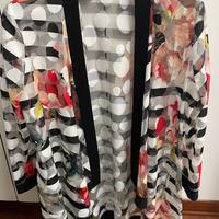 Coprispalla traforato