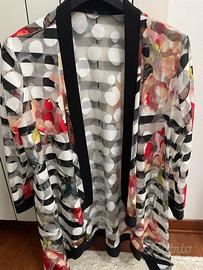 Coprispalla traforato