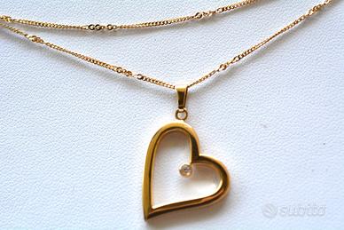 Collana e ciondolo  con forma di cuore realizzato