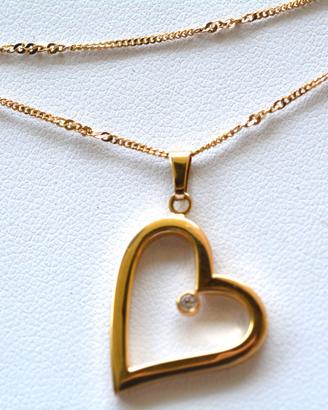 Collana e ciondolo  con forma di cuore realizzato