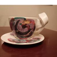 Tazza con piattino in ceramica