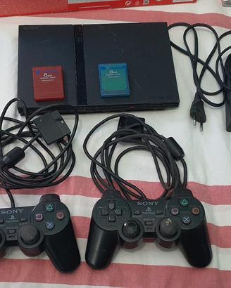 PS2 slim + 2 pad + 2 memory card