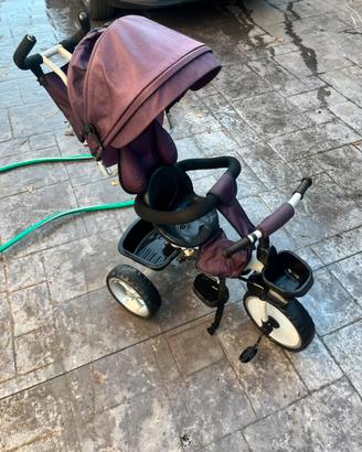 Triciclo per bambini con manico sterzante