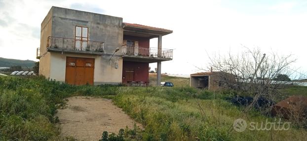 Terreno con casa di campagna