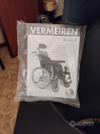 Carrozzina per persone con difficoltà motorie