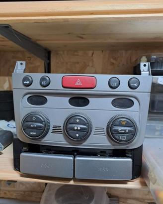 Autoradio comandi clima e portaoggetti alfa 147
