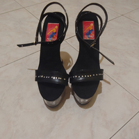 Scarpe alte con zeppa trasparente