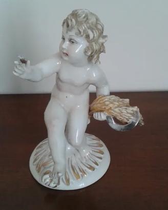 Statuetta Ceramica Capodimonte fanciullo con grano