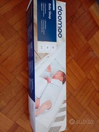 Cuscino per mantenere la posizione del neonato