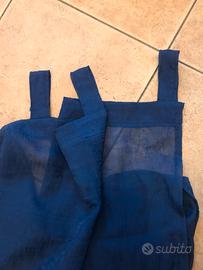 Tende blu reale con passanti