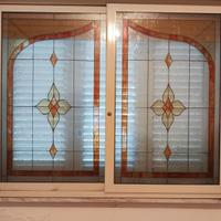 Vetrata scorrevole in alluminio.