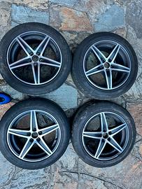 Set 4 cerchi lega OZ + Pneum. 205/55 R16 invernali