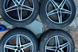 Set 4 cerchi lega OZ + Pneum. 205/55 R16 invernali