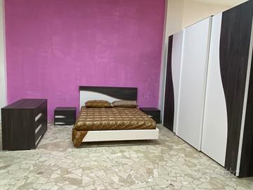 camera da letto in stile moderno