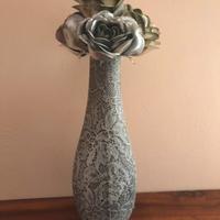 Vaso con fiori finti