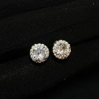orecchini tondi con diamante e zirconi