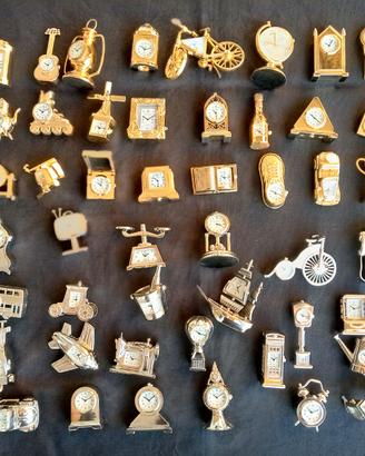 Lotto 48 orologini color oro argento Le Temps