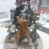 Statuina Capodimonte, vecchio su panchina